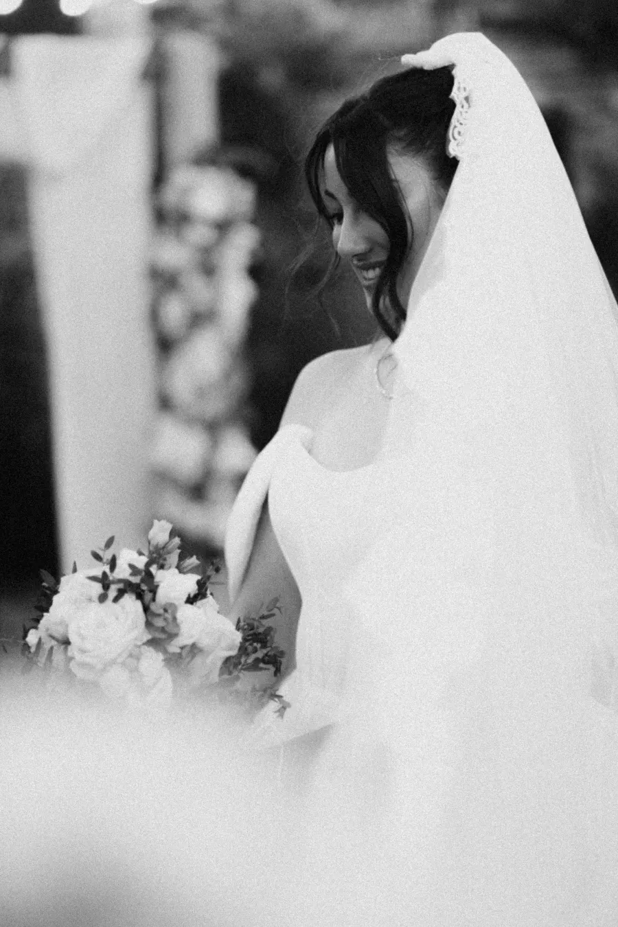 Bride in veil, profile, black and white